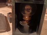 a light that is sitting inside of a box on the floor