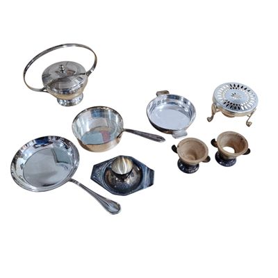 many different types of pots and pans on the table