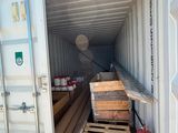 a container with a lot of wood inside of it