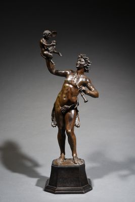 an image of a bronze statue of a woman holding a bird