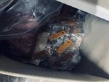 a bag of luggage sitting inside of a car