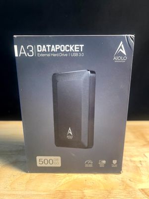 une boîte noire sur laquelle figure l'image d'une clé USB
