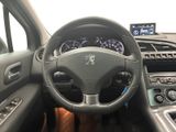 the interior of a car with a steering wheel and dashboard controls