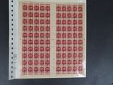 un gros plan sur une feuille de papier sur laquelle figurent de nombreux timbres