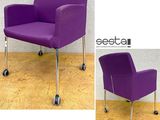 two pictures of a purple office chair with wheels on a wooden floor