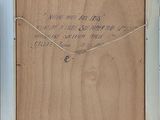 an image of a picture of a wooden frame with writing on it