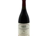 a bottle of wine that is sitting on a table