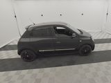 a picture of a small car parked in a garage