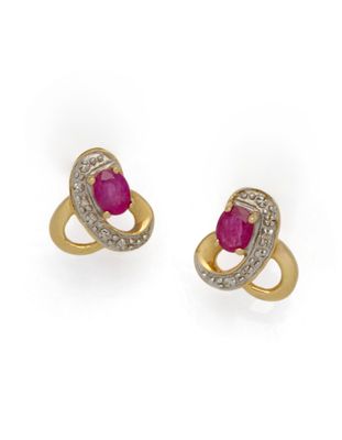 a pair of ruby and diamond earrings