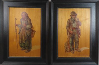 deux tableaux encadrés représentant un homme et une femme avec une canne