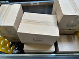 several boxes are stacked on top of each other in a carton