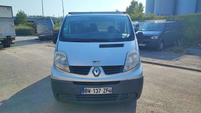 a white van that is parked in a parking lot