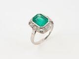 an emerald and diamond ring