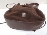brown sued purse with a monogrammed monogram on the front