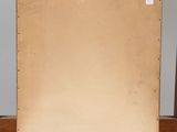 an old wooden easel with a blank canvas on top of it