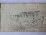 an old book with a drawing of a woman sitting on a chair