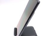 a close up of a cell phone on a stand