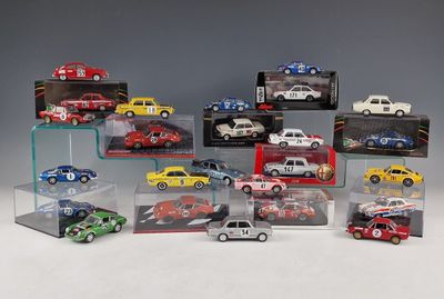 a lot of toy cars that are in a display case