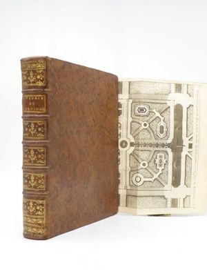 un livre dans lequel figure l'image d'une horloge
