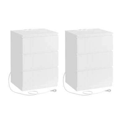 deux tiroirs blancs reliés à des fils, posés sur une surface blanche