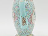 an image of a blue and white vase sitting on top of a table