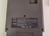 an image of a laptop battery on a white surface