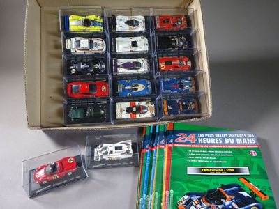 a box of assorted toy cars on a table
