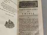 an open book with a picture of a man and a woman on it