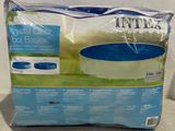 an image of a blue and white inflatable pool in a plastic bag