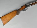 the rifle is laying on the table ready to be used