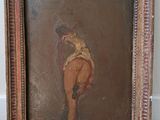 une peinture à l'huile représentant une femme tenant une batte de baseball posée sur une table