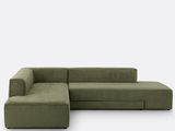an image of a green sectional couch with a chaise lounger