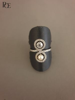 Bague fine en or gris 18k (750‰) ornée d'un diamant et d'une… - Photo 1