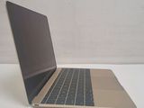 a laptop computer sitting on a table with a white background