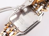 an image of a close up of a watch on a white surface