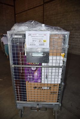 a metal cage with a bunch of items in it