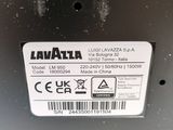 an image of a close up of a label on the back of a laptop