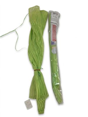 a green rope that is tied to a string