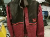 a jacket hanging on a rack in a garage
