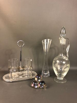 a lot of glass items that are on the table