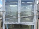 an image of a window on a pallet in a parking lot