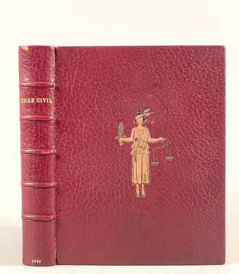 un vieux livre sur lequel figure l'image d'une dame tenant une épée