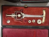 two different types of musical instruments in a case