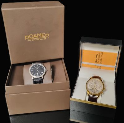 a box with a watch inside of it and a box with a watch inside of it