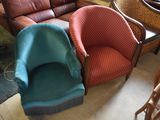 two chairs and a couch in a room together