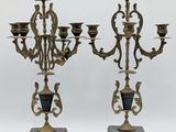 pair of antique brass candelabs with black marble bases