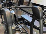 many different types of exercise equipment in this room