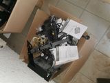 a box full of electronic equipment sitting on the floor
