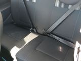 a seat belt in the back of a car