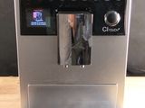 an image of a coffee machine on a wooden table